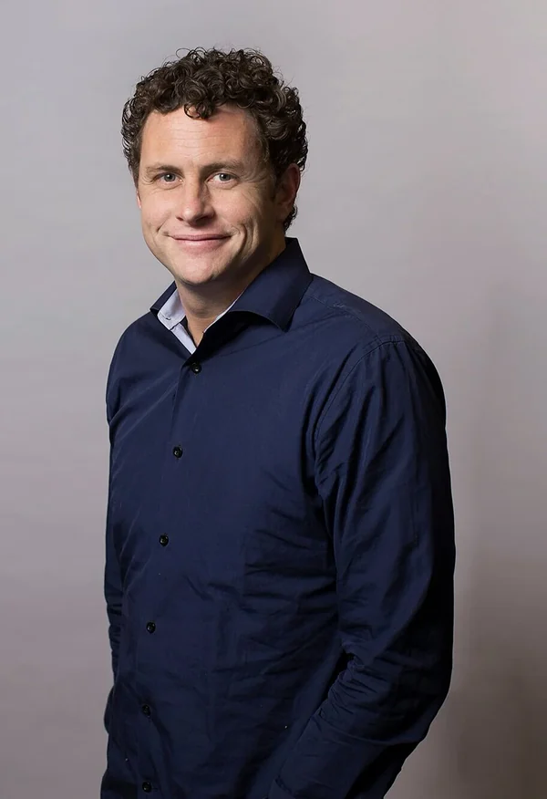 Michael Smallbone, fundador y abogado de inmigración de First Class Immigration